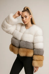 Women's cropped faux fur jacket in white, gray, and brown color block - stylish winter fashion
